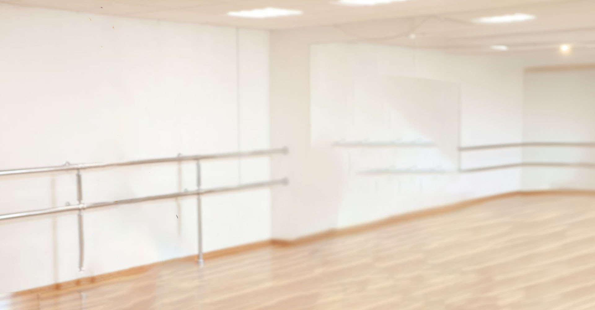An empty dance room in the background